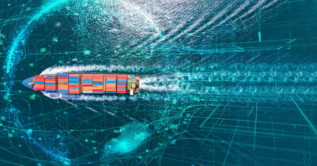 Modern cargo ship arriving at a port
